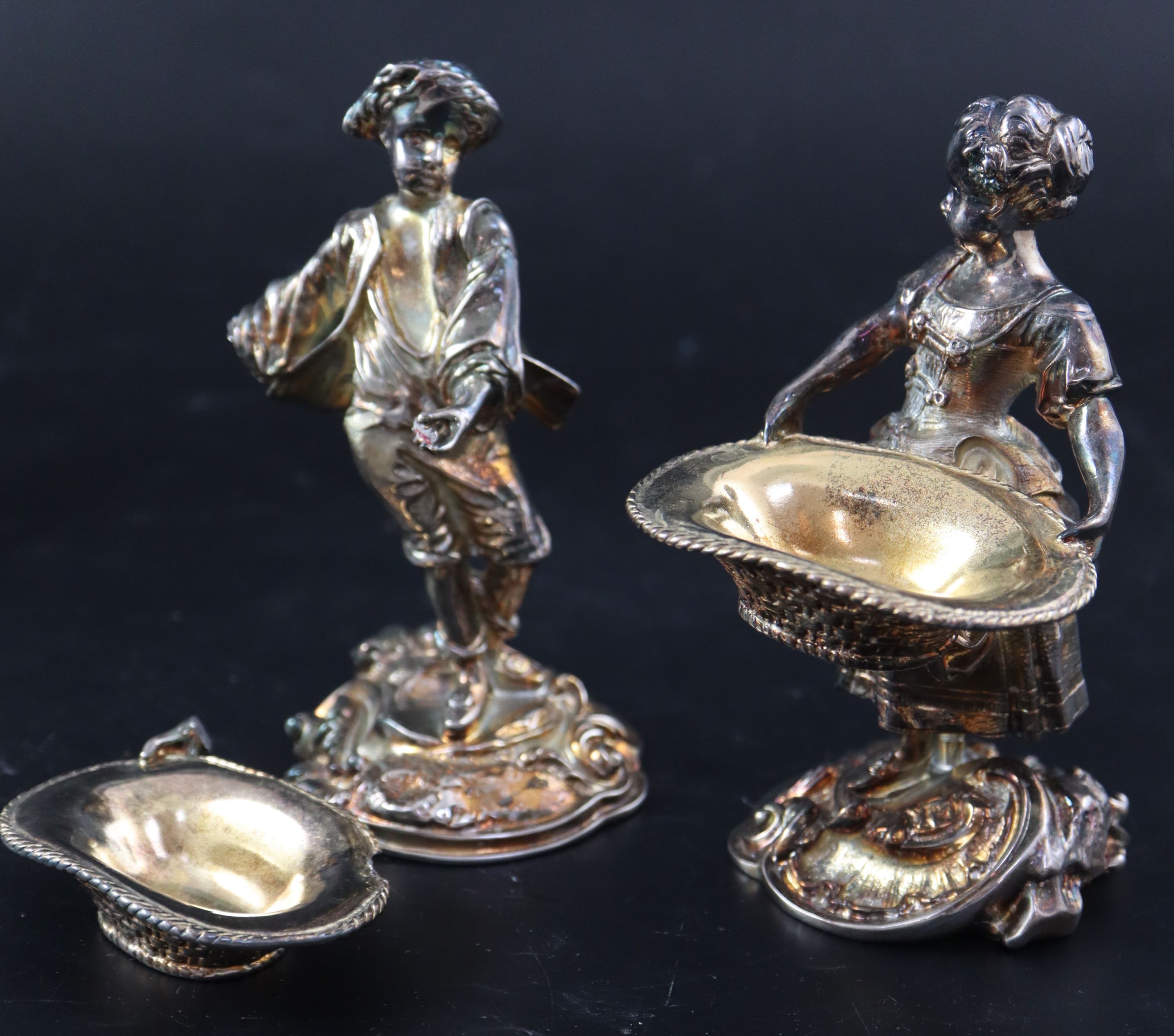 Two pairs of modern silver plated figural table salts, 17cm (one pair a.f.).